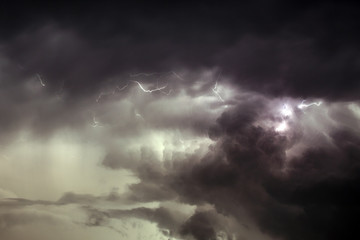 Fototapeta na wymiar Cloudscape with thunder bolt