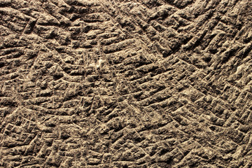 Chiseled stone texture. Fragment of ceiling in ancient cave city Vardzia, Georgia
