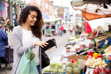 young woman shopping at the market