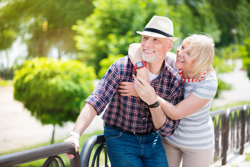 Aged couple enjoying each other