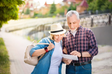 Aged couple enjoying each other