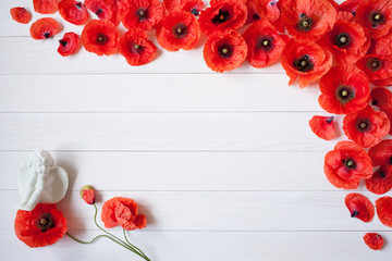 Wooden background with poppies