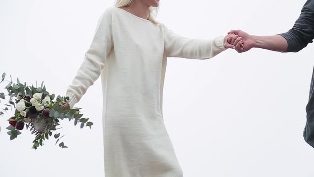 Men and women walking on the roof.