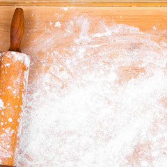 baking background with pastry board and rolling pin