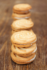 Stack of delicious biscuits with cream