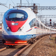 Modern high-speed train departs from Moscow.