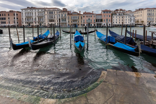 Gondolas parked on the Grand Canal in Venice, Italy