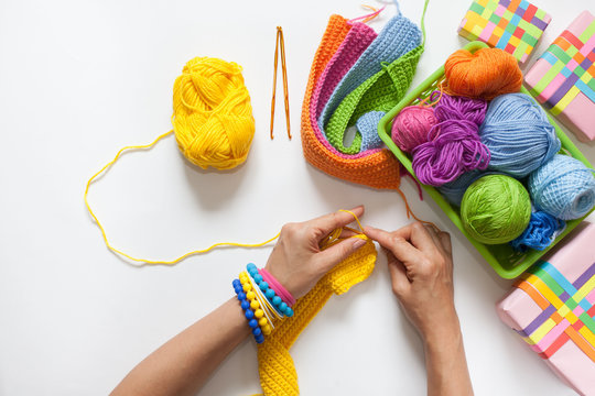 Balls of colored yarn. View from above. All the colors of the ra