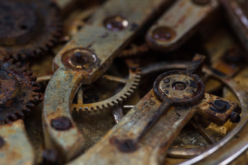 Rusty gears in an old pocket watch