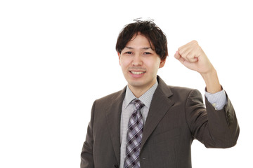 ガッツポーズのビジネスマン