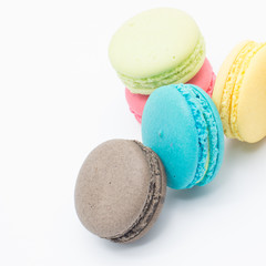 Sweet and colourful french macaroons or macaron on white backgro