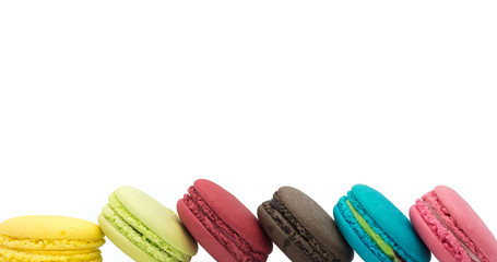 Sweet and colourful french macaroons or macaron on white background