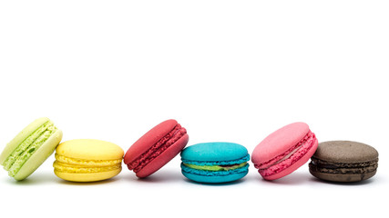 Sweet and colourful french macaroons or macaron on white backgro
