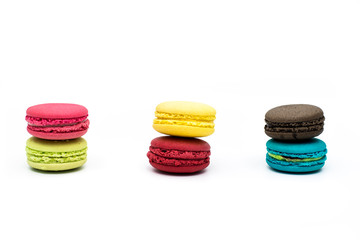 Sweet and colourful french macaroons or macaron on white background