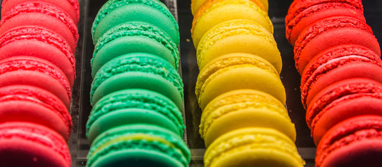 Colourful macaroons in row