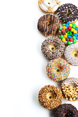 Delicious donuts with icing isolated on white