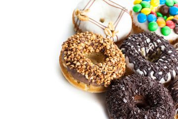 Delicious donuts with icing isolated on white
