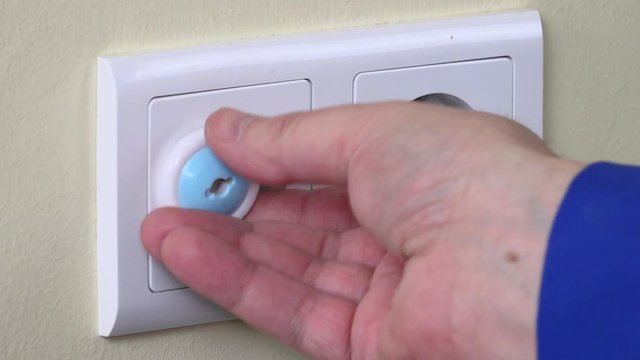 Hand pull out plug wire from outlet and insert child safety plug