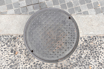 Rusty, grunge manhole cover