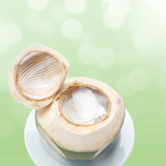 sweet in thai - woon ma praw orn - young coconut jelly on green background