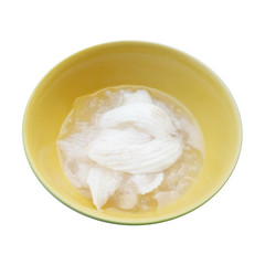 sweet in thai - woon ma praw orn - young coconut jelly in yellow bowl isolated on white background