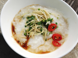 asian food - a bowl of congee with minced pork on grunge background

keyword