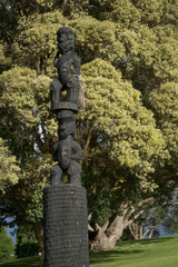 Maori carving style wood statue