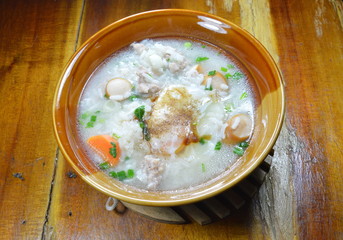 boiled rice with pork sausage topping egg on bowl