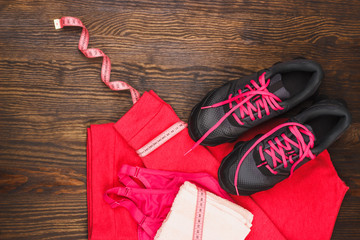 Sports sneakers, towel and sports bra