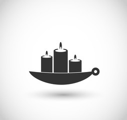 Three candles on a bowl icon