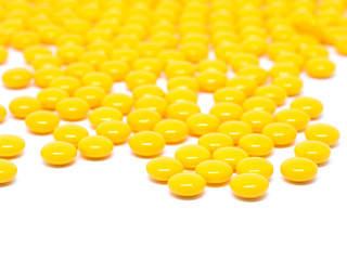 yellow sugar coated tablets pills