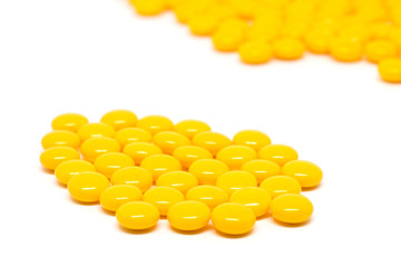 yellow sugar coated tablets pills