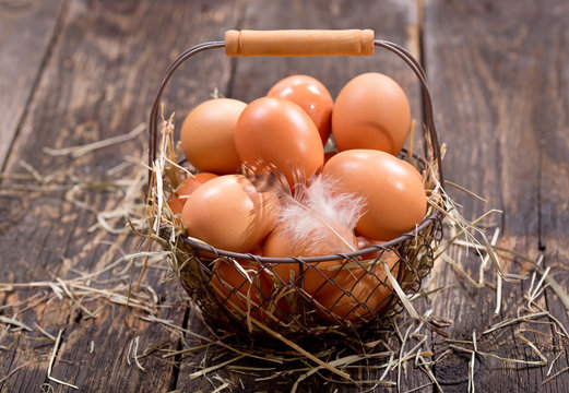 fresh brown eggs in a basket