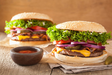 bacon cheese burger with pickles tomato onion