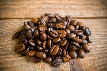 Coffee Beans on Vintage Wood Table