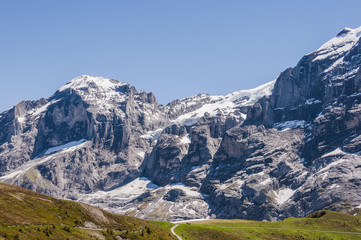 Fototapeta na wymiar Grindelwald, Alpen, Berner Oberland, Engelhörner, Wetterhorn, Grosse Scheidegg, Schweizer Berge, Wanderweg, Wanderferien, Sommer, Schweiz