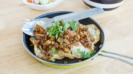 Indochina pan-fried egg with toppings in Thai style