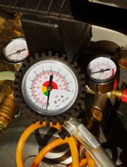 Air pressure gauge in a car workshop
