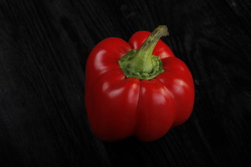  pepper on wooden background