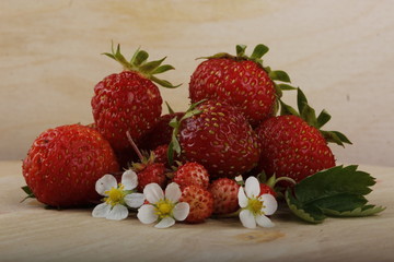 wild strawberry on wooden background