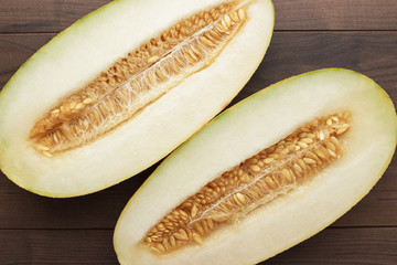 pieces of sweet melon on the wooden table