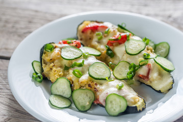 Stuffed zucchini with couscous and mozzarella