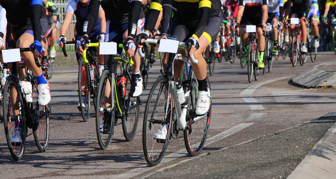 cyclists run fast on bicycles during the sports competition