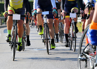 Fototapeta na wymiar cyclists run fast on bicycles