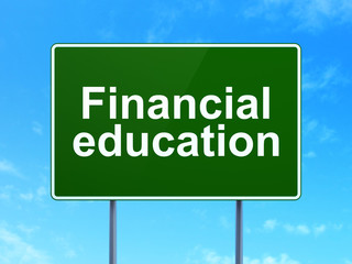 Learning concept: Financial Education on road sign background