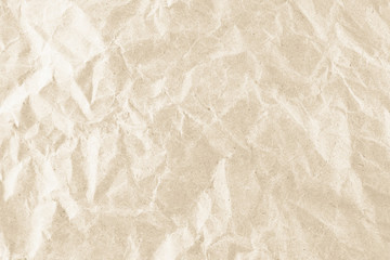 Crumpled brown color paper pattern texture background