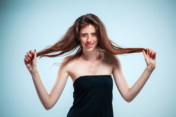 The young woman's portrait with happy emotions