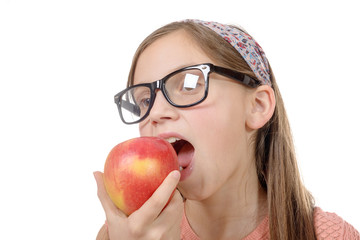 child girl eats a apple