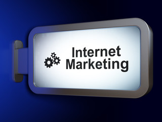 Marketing concept: Internet Marketing and Gears on billboard background
