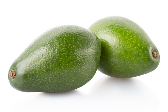 Avocado fruits isolated on white, clipping path